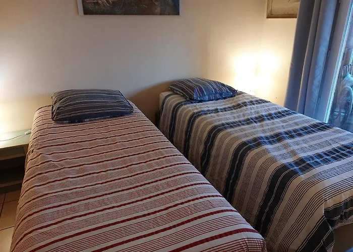 Home Tranquille Dans la Cité du Mimosa - 2 étoiles - Axelle Loc'Appart